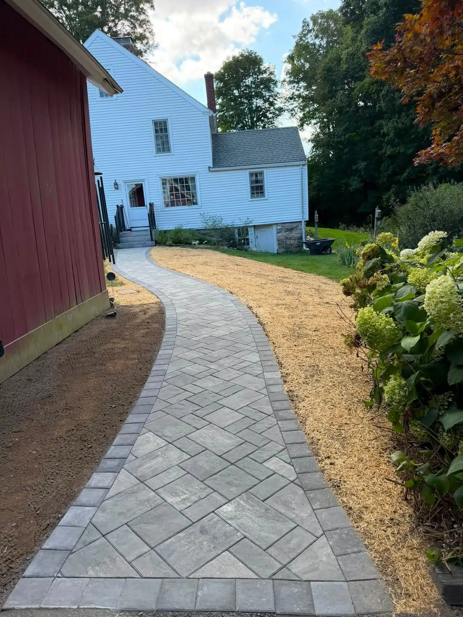 Unilock walkway installation and hardscaping services in Preston, CT by Spicers Lawn Care & Landscape Design